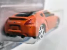 Nissan 370z (2020) - оранжево/черно - Maisto - 1:64