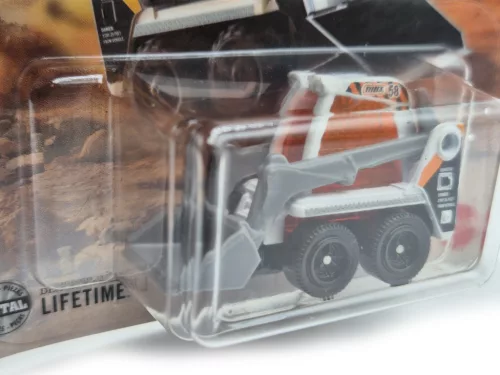 Skidster - bobcat челен товарач багер - 121/125 - блистер - Matchbox - 1:64