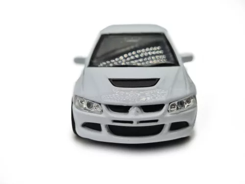 Mitsubishi Lancer Evolution VIII - бял - Welly - 1:34
